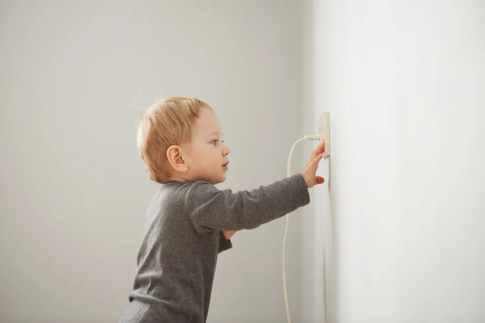 Why You Should Baby-Proof Electrical Outlets & How To Do It Right