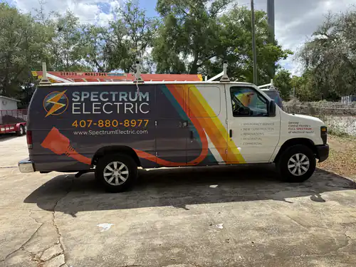 Spectrum Electric service van parked outside the Winter Park job