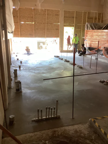 Fresh slab pour with conduit stub ups inside the Hunter's Creek water facility